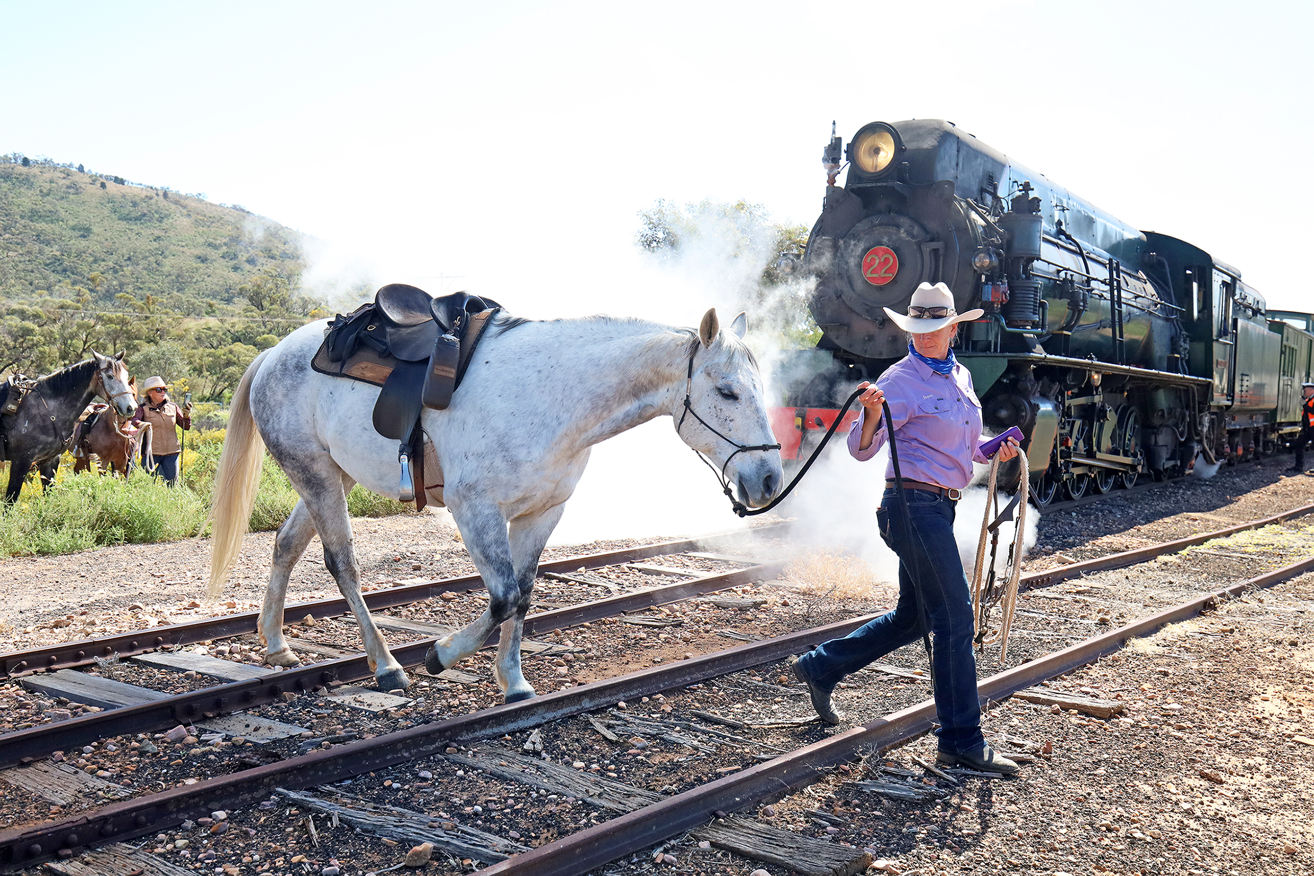 Jenni with her horse on her private trail ride with a group of 30-35 horses on our Pichi Richi Railway Steam Train in September 2026